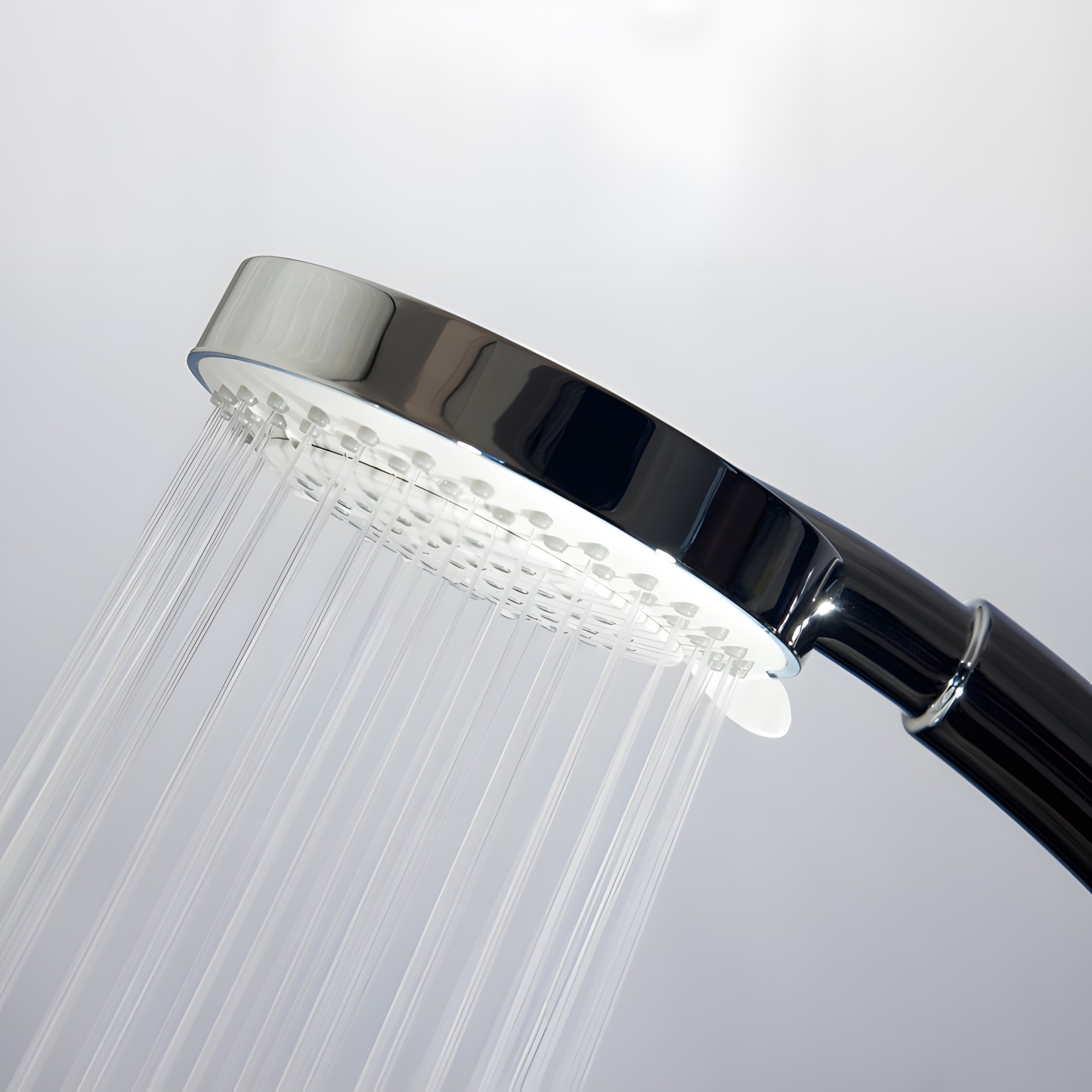 Douchette multifonctions en ABS chromé et flexible inox double agraffage