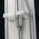 Tablette de rangement et flexible douchette en inox avec système anti-torsion